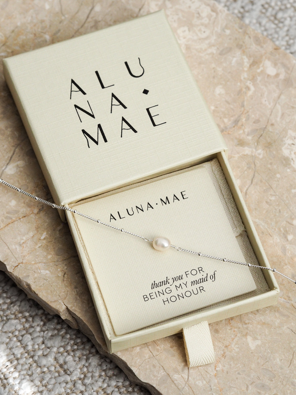 Delicate silver chain bracelet with a freshwater pearl, presented in an Aluna Mae gift box with a “thank you for being my maid of honour” message.