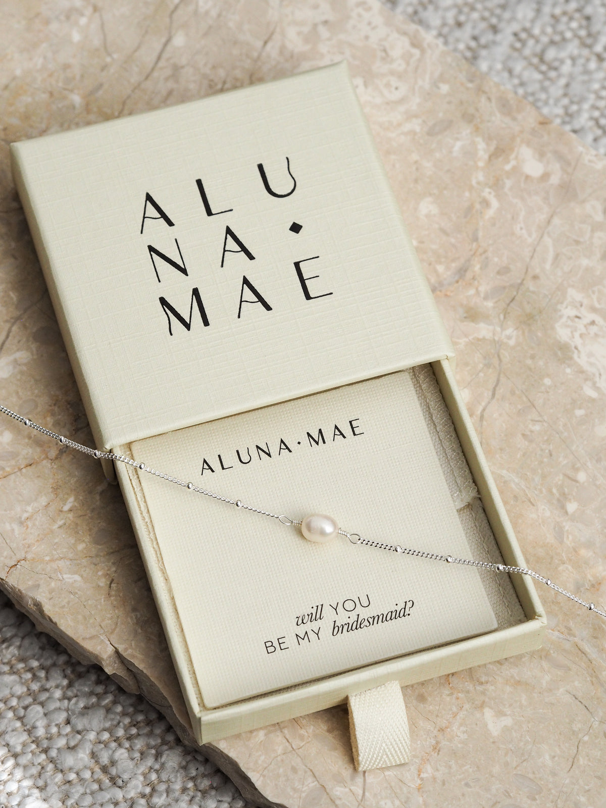 Silver chain bracelet with a single freshwater pearl, presented in an Aluna Mae gift box with a “will you be my bridesmaid?” message.