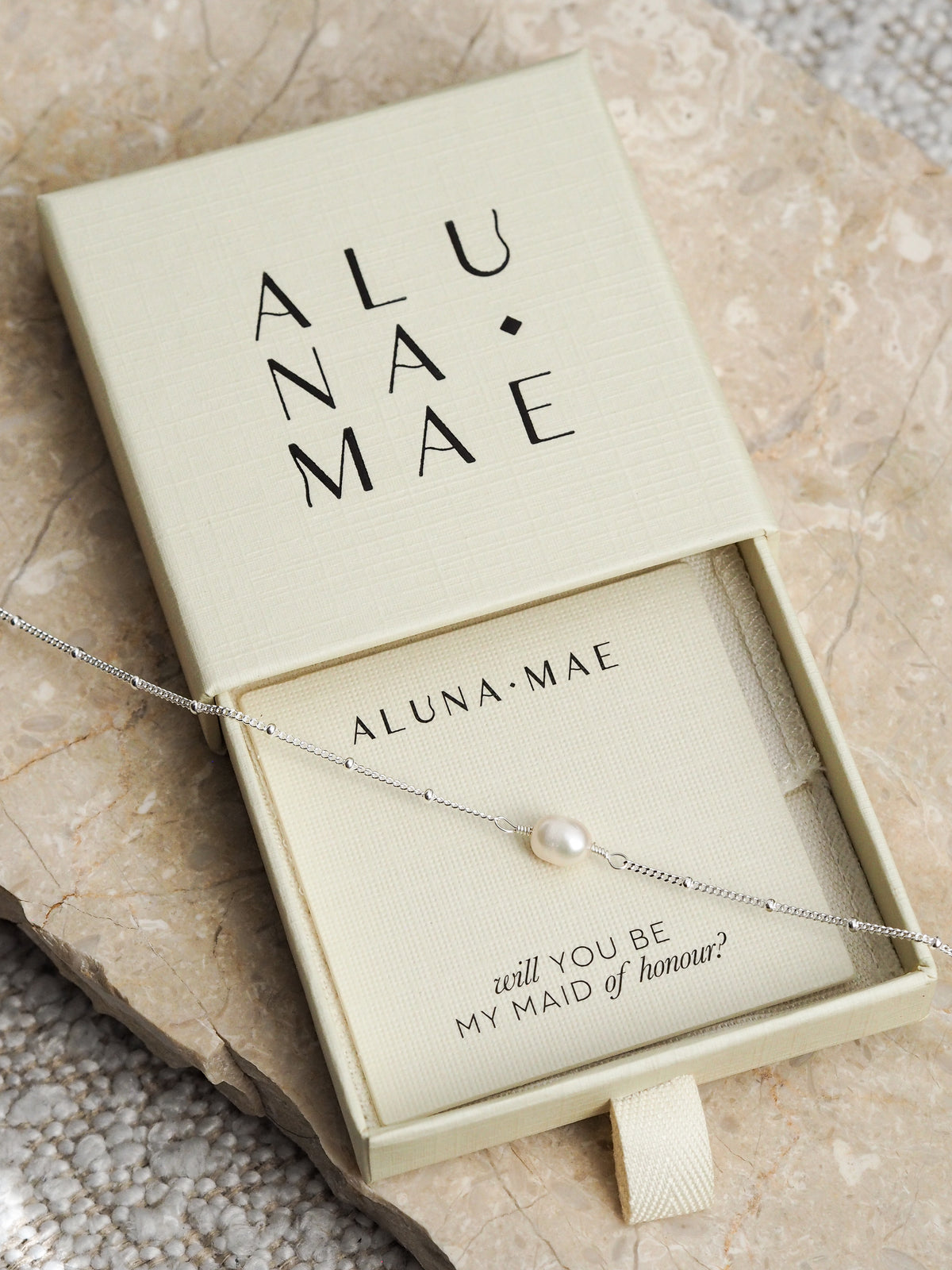 Silver chain bracelet with a freshwater pearl, displayed in an Aluna Mae gift box with a “will you be my maid of honour?” message.